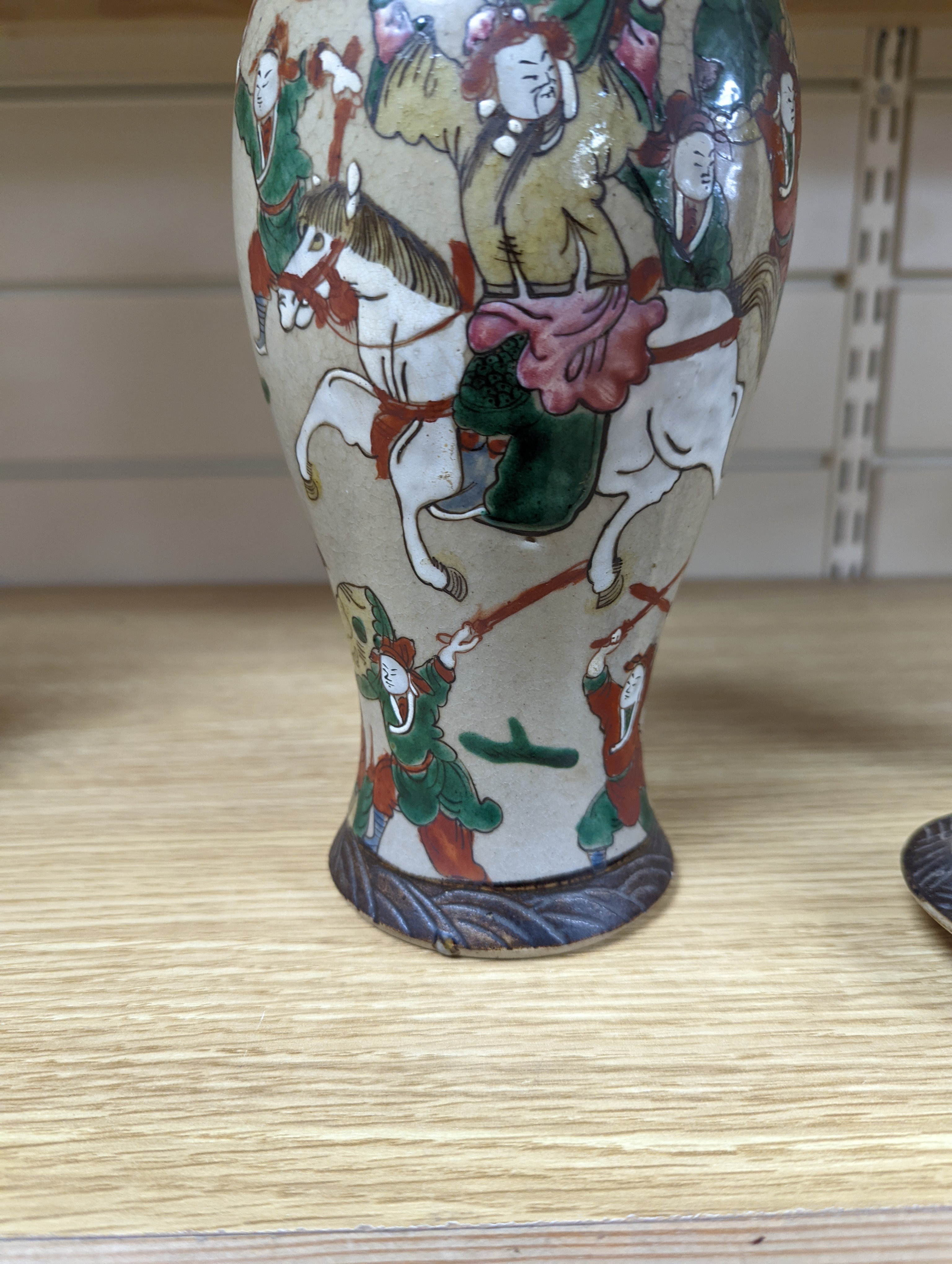 A late 19th century Chinese crackle glaze famille rose baluster vase and cover 30cm